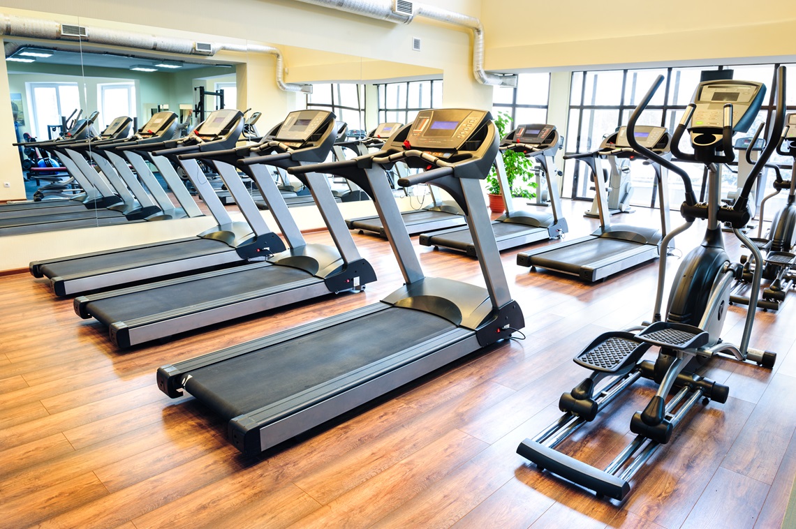 Set of treadmills staying in line in the gym